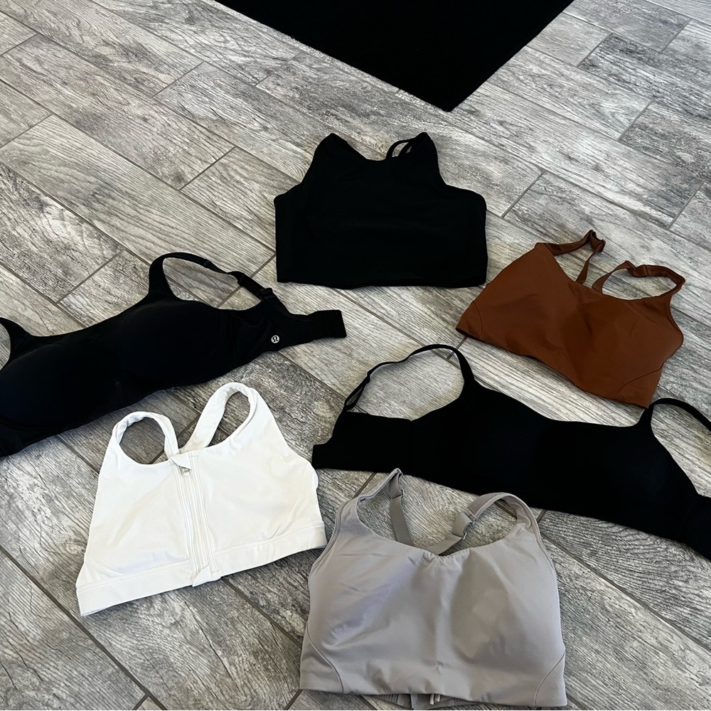 Mix of Sports Bras in size Medium and 34 DD from Lululemon, Athleta, and Aerie